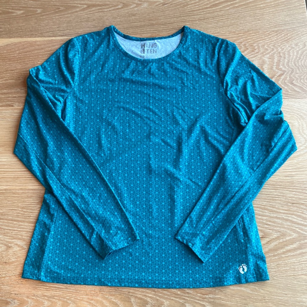 Hang Ten women’s real long sleeved rash guard. Never worn. Large